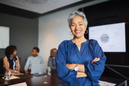 a confident leader in a boardroom meeting