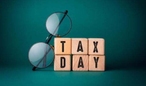 tax day wooden blocks and glasses