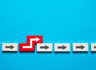 one red arrow skipping over a queue of arrows