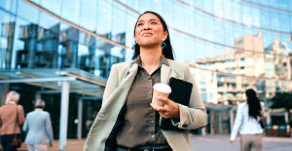 confident businessperson walking to the office