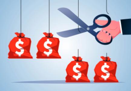 scissors cut money bags hanging from rope