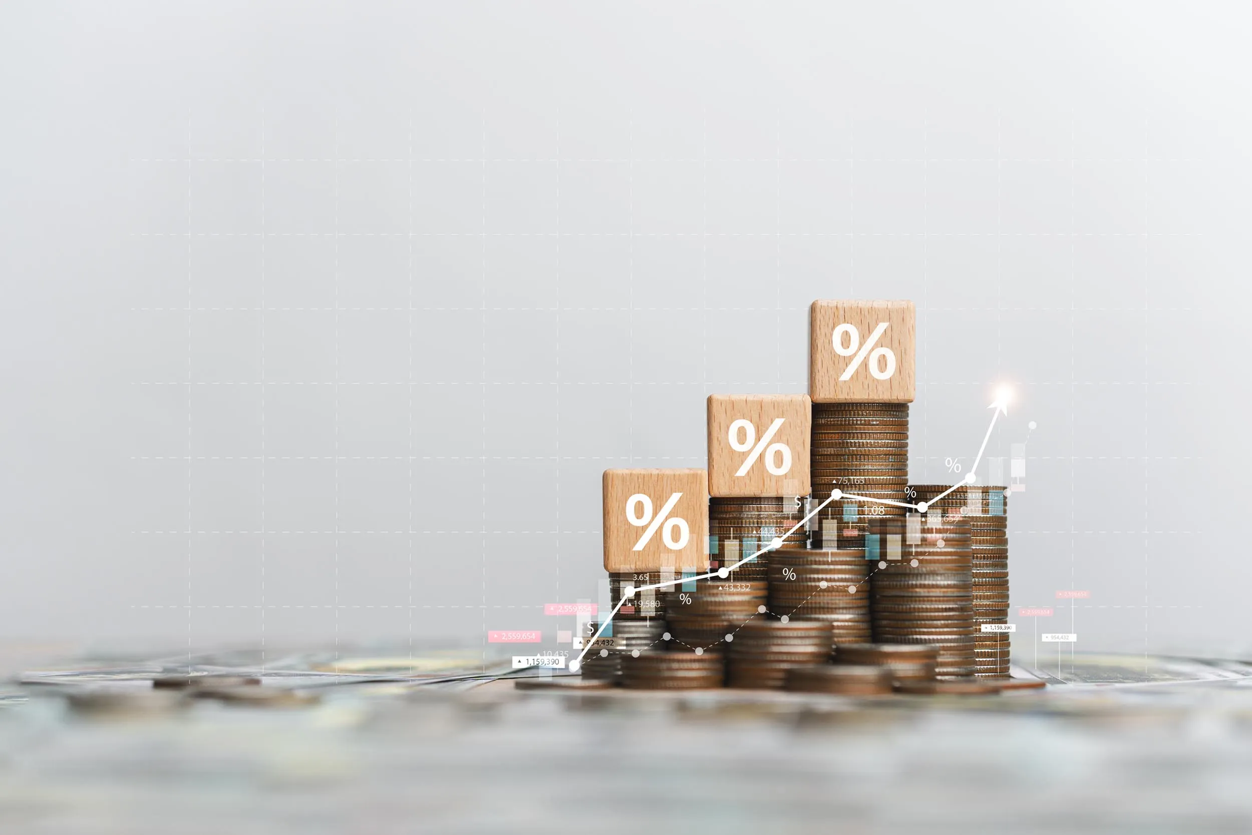 coin stacks and a graph showing investment growth