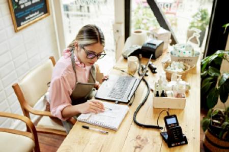 a small business owner doing bookkeeping