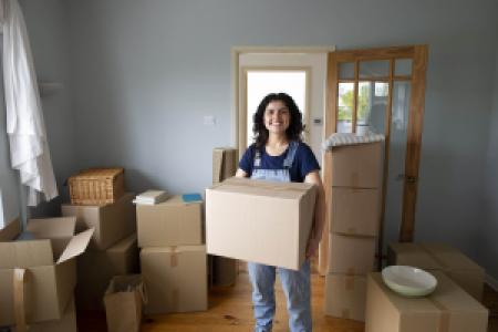 a person ready to move with boxes in the house